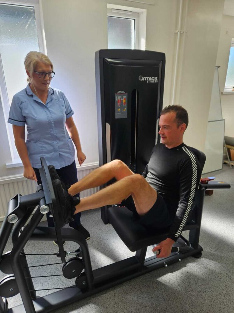 Physiotherapy leg press in use